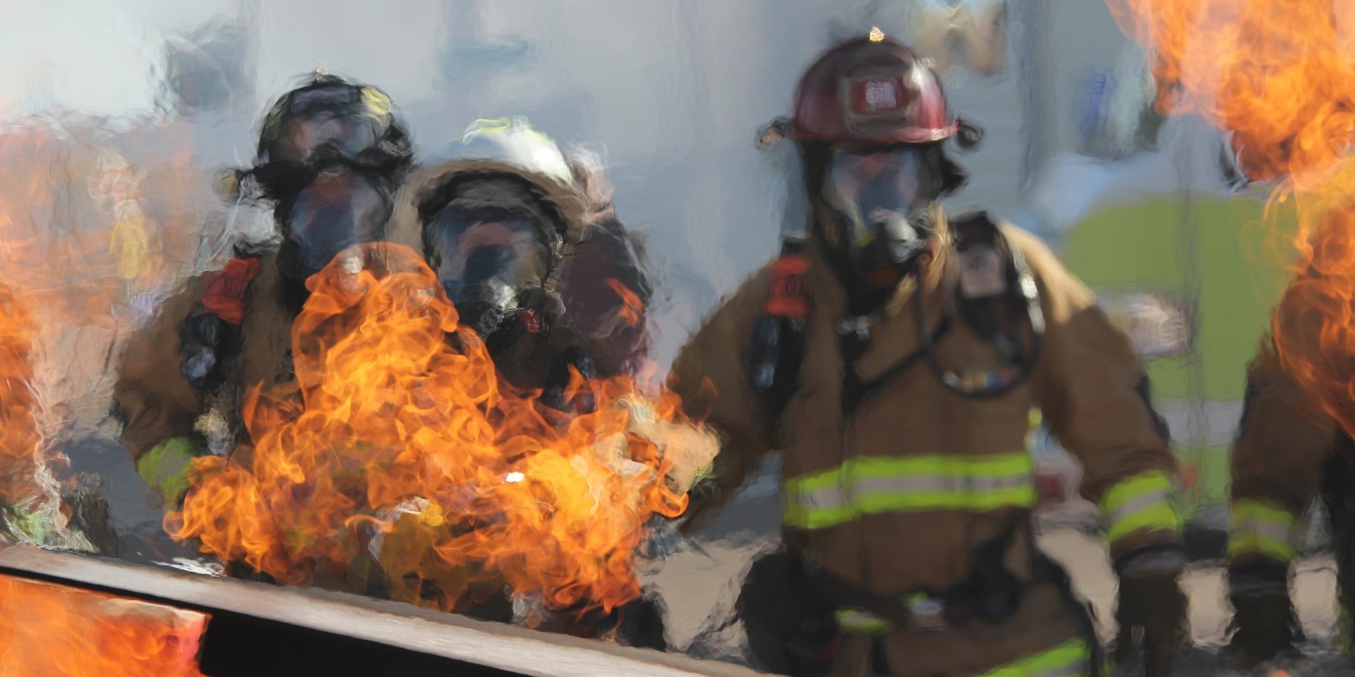 firefighters battling flame from 18-wheeler accident